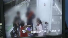 Woman pushes over pram after argument over iPad with baby's parents