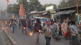 Bihar teachers are protesting on the road against the state government with burning tires in their hands in Northern India
