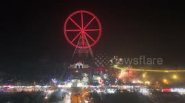 Residents and tourists set off fireworks to welcome the Chinese New Year at Luoma Lake in Suqian