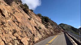 Boulders tumble down hillside in California