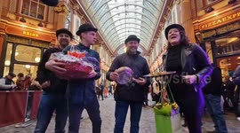 Flipping for victory!: Bowler-hatted contestants race in the fifteenth Leadenhall Market pancake race