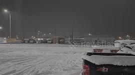 US | Snow falls in the streets of Browning, MT as a Winter Weather Advisory is in effect.