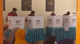 Voters gather to cast their ballots for president and parliamentary representatives in Indonesia's biggest ever one-day election