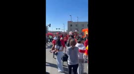 Kansas City shooting: Aftermath footage shows Sirens in the background, ambulances in the streets, people on stretchers.