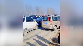 Row of parked cars engulfed by flames allegedly started by lit firecrackers