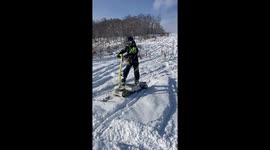 Electric Snowboards Cruise Up and Down Snowy Hill