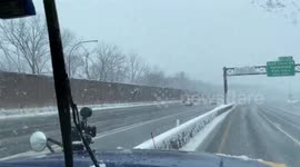 Department of Transportation Crews Maintain State Roads During Snowstorm in New York, USA