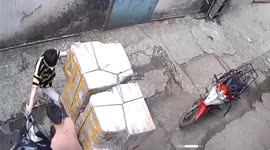 The man's motorbike was overturned because it was overloaded