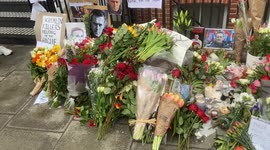 Alexei Navalny supporters continue to lay flowers and tributes outside the Russian Embassy in London