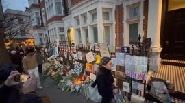 Huge pile of floral tributes for Alexei Navalny outside Russian embassy in London