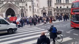 Several hundred protests congregate outside the Royal Courts of Justic for Julian Assange's extradition verdict