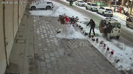 Trio Playfully Adopts Snowman: Chinese Residents' Snowy Surprise