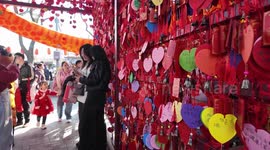 Tourists Visit a Blessing Wall in Xian, China 