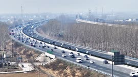 Vehicles Travel on the Beijing-Hong Kong-Macao Expressway in Hebi, China