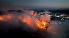 Armed police brave day and night to tackle massive mountain fire emergency in southwestern China