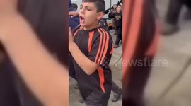 Kids in northern Gaza bang pots and pans demanding an end to conflict with Israel