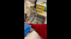 Woman learns that washing fluids out of eyes isn't child's play