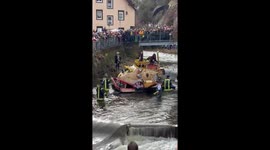 Locals flock to watch makeshift wooden boats take on rapids in Germany