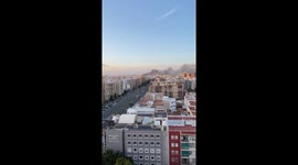 Heavy smoke can be seen as Housing block erupts into flames and smoke billows metres into the air in Valencia , Spain