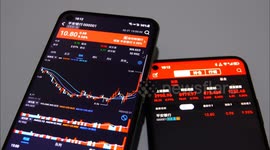 The price of Ping An Bank is shown on the mobile phone in Yichang,  China