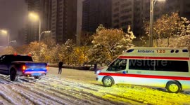 Pyjama-clad hero races in off-road vehicle to rescue ambulances trapped in snow in China