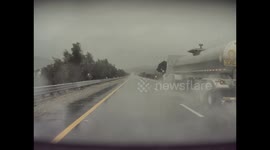 Tesla Hydroplanes Into Guard Rail