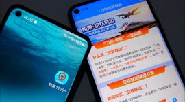 A citizen shows on his mobile phone the railway 12306 APP in Yichang, China