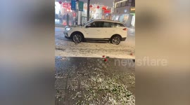 River of hail blocks traffic and nearly drags away vehicles in China