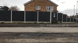 Residents baffled after council can 'only afford' to repair half the road - leaving most full of potholes