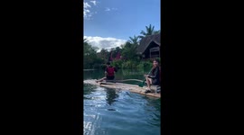 Bamboo raft selfie gone awry as phone takes a dive in Tiaong, Quezon