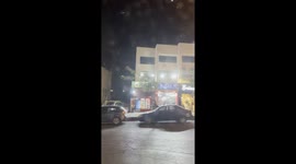 Driving around Amman, capital city of Jordan, at night surprised by the big amount of colorful lights of the shops.