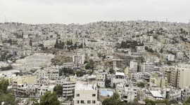 View of Amman, the capital city of Jordan, from above including a good part of the old downtown, the Roman theatre and even some of the amazing street art of the town can be observed.