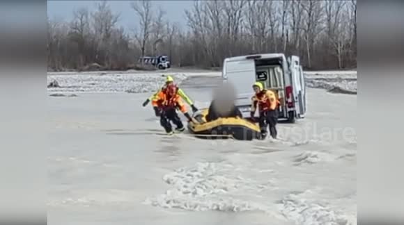 Two Men Rescued from Van Stranded Due to Rising Water Levels in ...