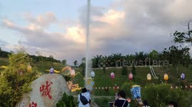 Shouting Spring in Malaysia Temple, can adjust the water output by shouting