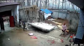 Quick-thinking sister's timely warning saves brother as wall collapses during demolition