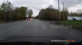 Russian dash cam captures accident as driver attempts last-minute overtake