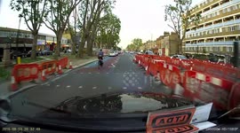 Cyclist collides with opened door, escapes with minor injuries