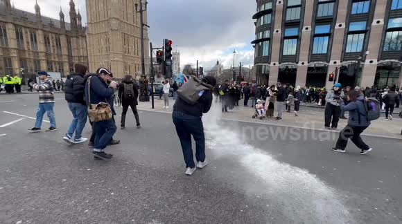 Protester spills flour on street as Pro-Palestine protesters gather in Westminster day after Rishi Sunak speech on extremism