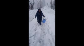 Vaccine workers brave bone-chilling cold and snowy terrain to inoculate polio vaccine to children in Kashmir