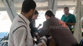 Medial workers set up makeshift clinic to treat wounded Palestinians in Rafah