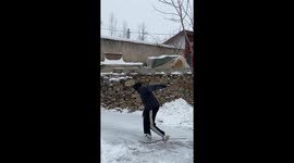 Man jogs in place on slippery snow like treadmill
