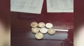 Ancient coins unearthed in central India, stirring dispute among locals
