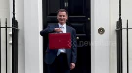 Jeremy Hunt leaves  Downing Street ahead of revealing spring budget