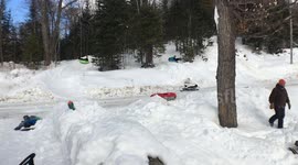 Tube Sledders Crisscross in the Air