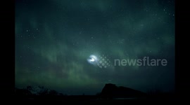 Spectacular Spiral Cloud in nightsky seen in Norway by aurorahunting photographer - SpaceX rocket de-orbit burn