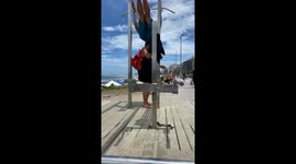 Woman Interrupts Guy's Beach Workout