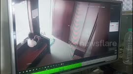 Leopard enters Wedding hall office , inches away from 12-year-old boy on phone , Brave boy locks leopard