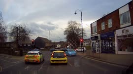Shameless masked kids on bikes throw food at police officers