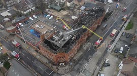 Drone footage shows Forest Gate police station's roof completely destroyed after blaze