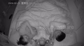 Baby Croons Parents to Sleep in China